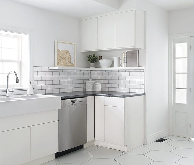 white kitchen open shelves hexagon floor tile